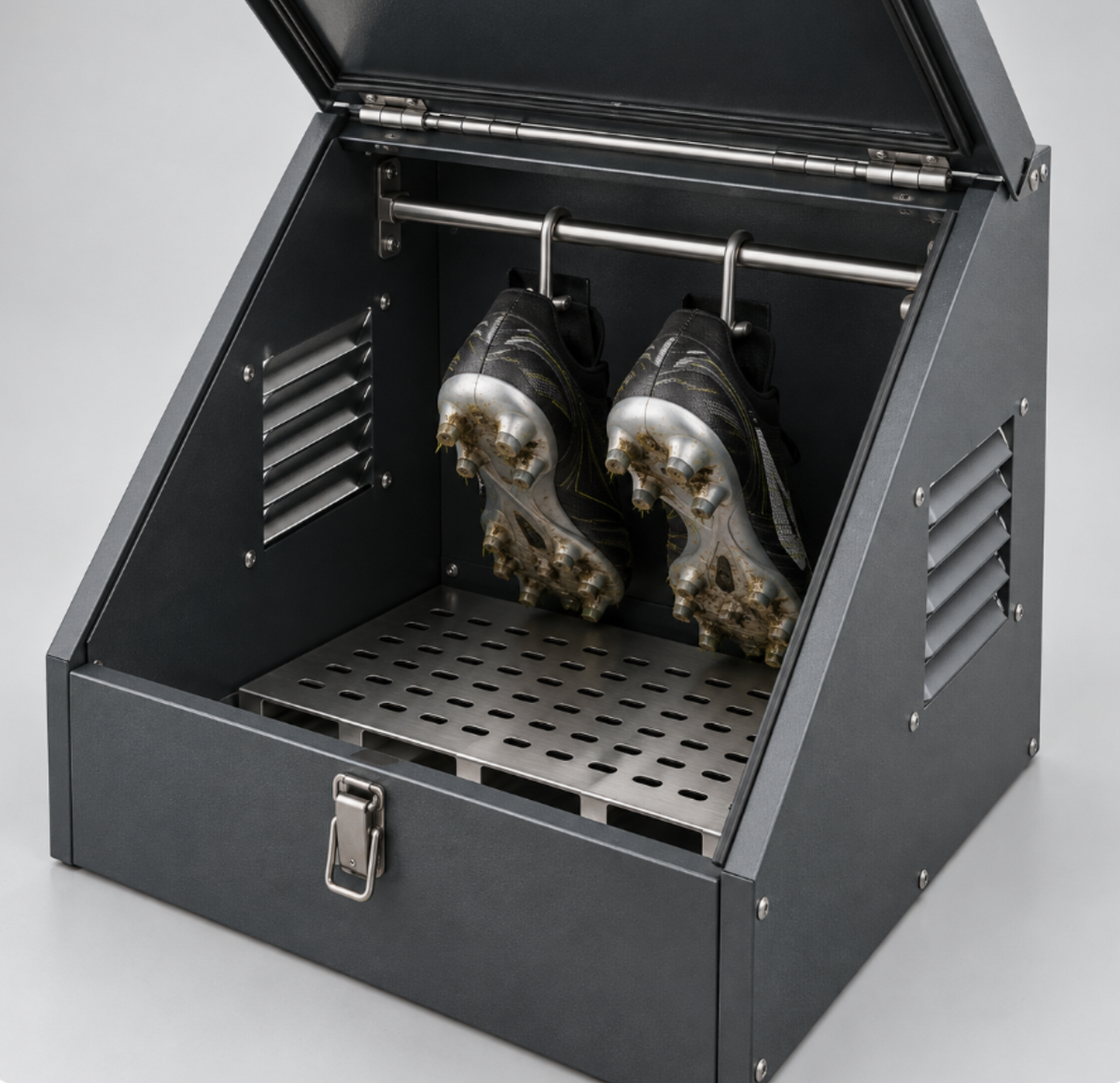 Boot Out odour eliminator box with football boots inside
